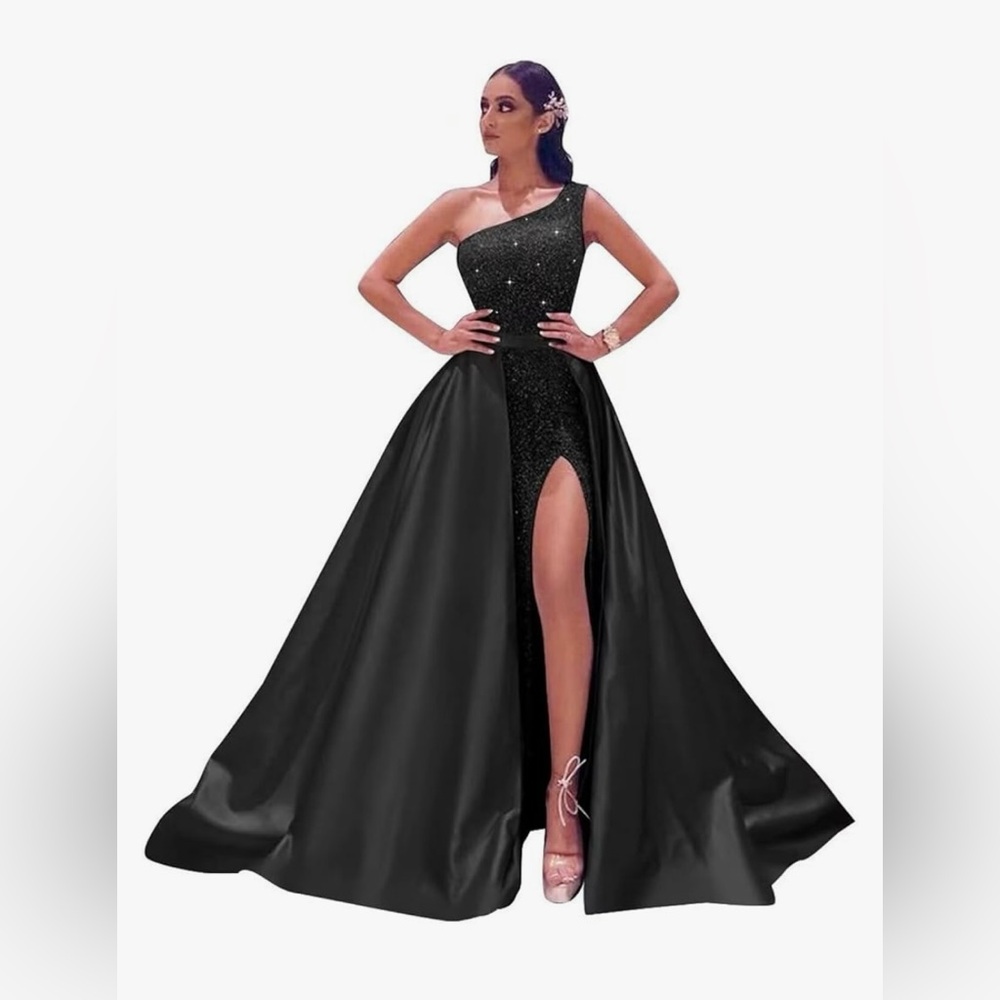 Black ball gown with detachable train. One shoulder sparkly. Satin train.